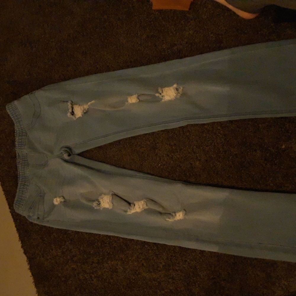 Light blue ripped jeans size medium